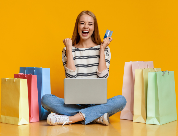 teen girl shopping online with credit card